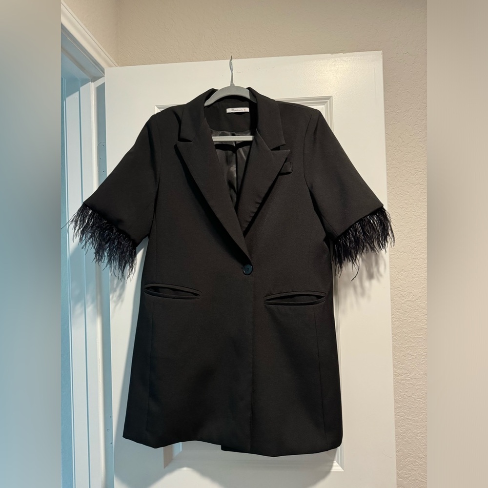 Black suit dress with feathers